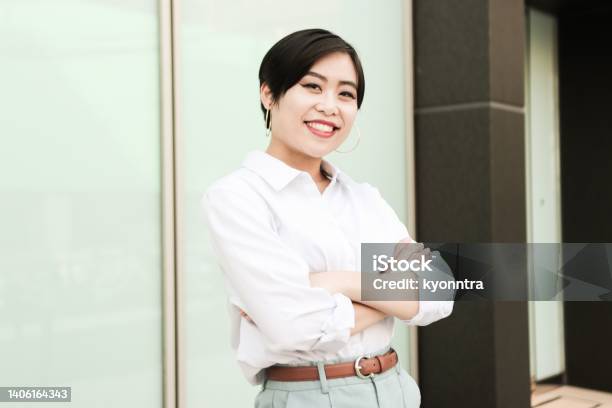 Portrait Of Asian Businesswoman With Smile Stock Photo - Download Image Now - Beautiful Woman, Non-Binary Gender, Asian and Indian Ethnicities