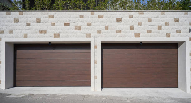 istock Two car garage with wide garage doors 1406167059