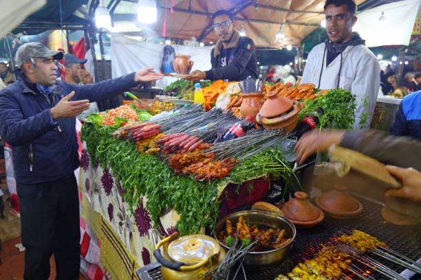 comida jemaa el-fnaa em marrakech - jema el fna - fotografias e filmes do acervo