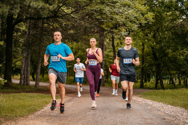 istock Group Of People Running A Marathon 1406172611