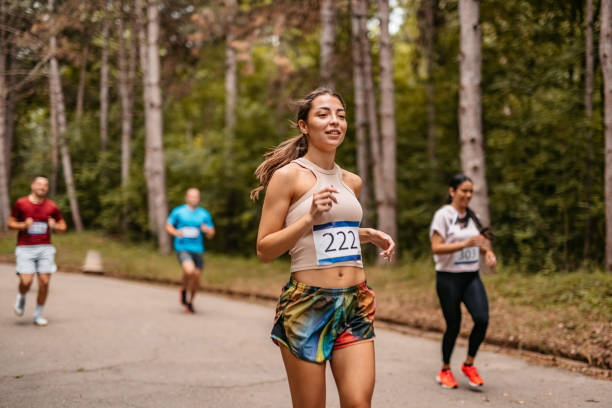 istock Group Of People Running A Marathon 1406175141