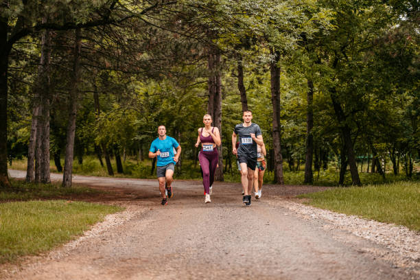 istock Group Of People Running A Marathon 1406175579