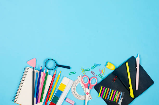 istock Flat lay composition with colorful school supplies on blue background. 1406177450