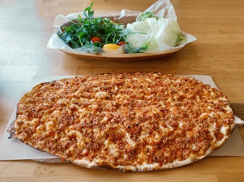 Traditional turkish lahmacun ground beef pita bread serving at Istanbul turkey
