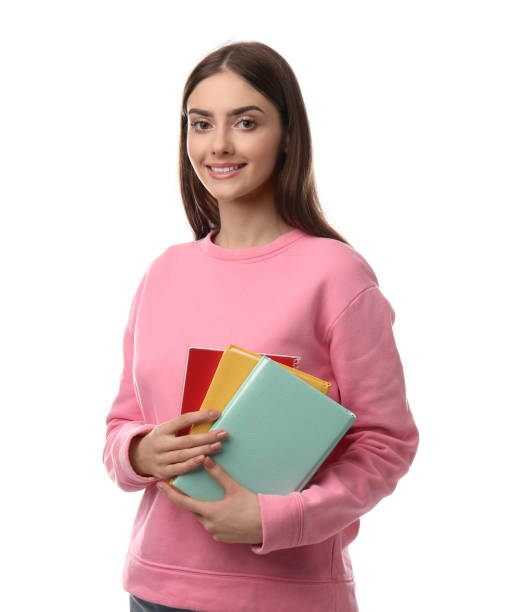 istock Teenage student holding books on white background 1406180582
