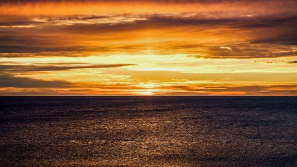 istock Sunset at Margaree Harbour Beach, Nova Scotia, Canada 1406180724