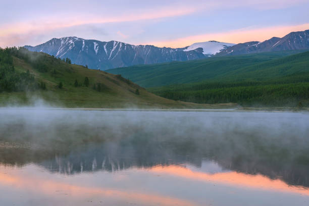 istock lake mountains dawn fog summer 1406183738
