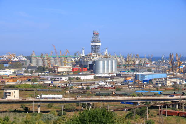 old industrial port in romania September 15 2021 - Constanta in Romania: the Industrial port quay with heavy load gantry cranes, the largest on the Black Sea and the 18th largest in Europe wharfe river photos stock pictures, royalty-free photos & images