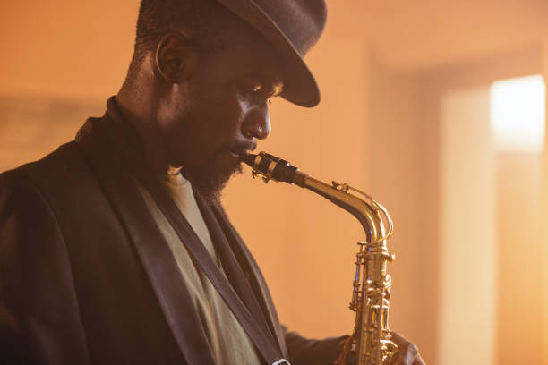 istock African Jazz Musician Playing Saxophone In A Recording Studio 1406185031
