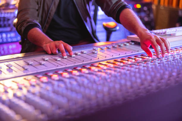 Close Up Of A Producer Working In Studio stock photo
