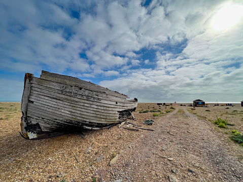 A lonely ship abandoned on the shore