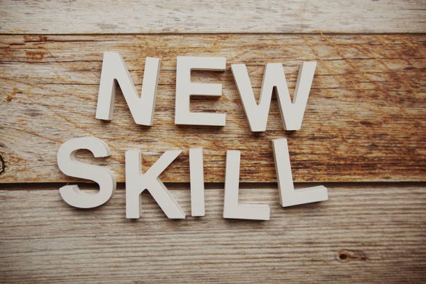 istock New Skill alphabet letters on wooden background 1406185538