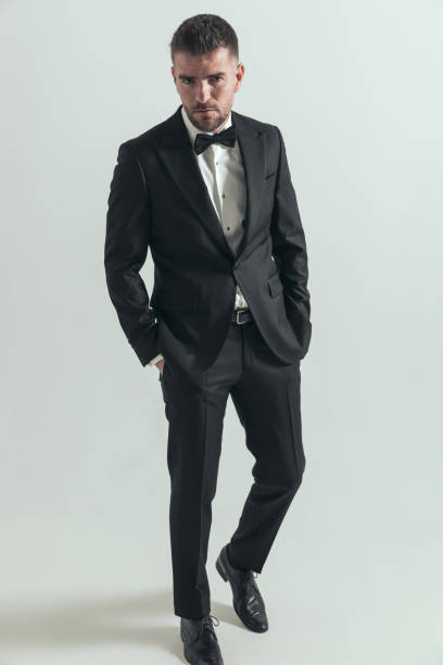 istock businessman posing with a good posture, holding hands in pockets 1406187281