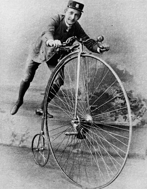 How to mount a penny farthing bicycle the best way Illustration from 19th century. penny farthing bicycle stock illustrations