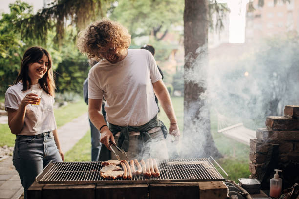 istock Couple on barbecue party 1406188840