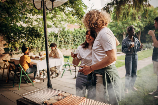 istock Couple on barbecue party 1406188886