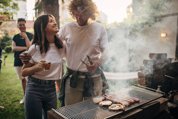 istock Couple on barbecue party 1406189599