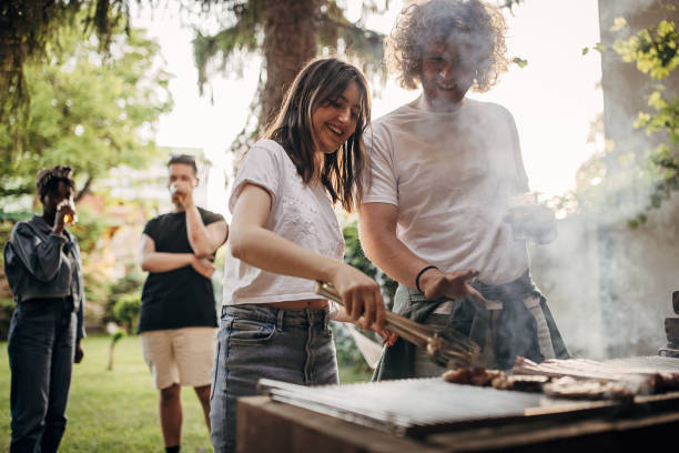 istock Couple on barbecue party 1406189614