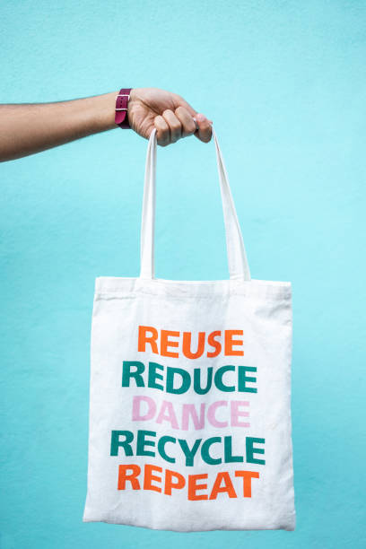 istock Hand holds a fabric shopping bag 1406195839