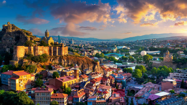 Panoramic of Tbilisi city at sunrise in Georgia. stock photo