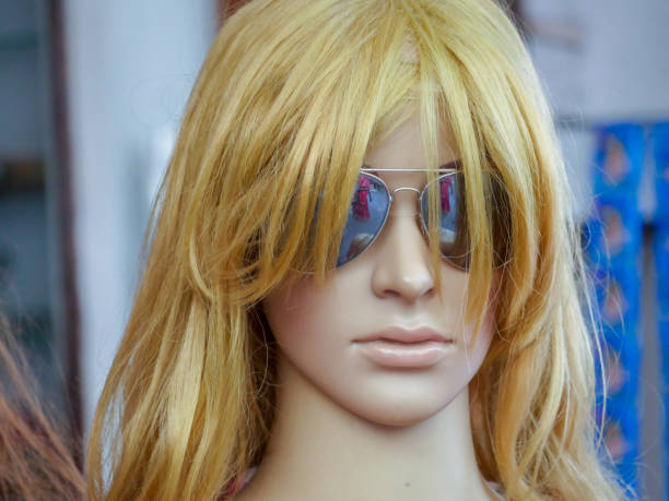 Pushkar, Rajasthan / India - November 5, 2019 : Dummy Mannequin Statue Woman Model outside a women clothing shop for display of trendy dresses for ladies.