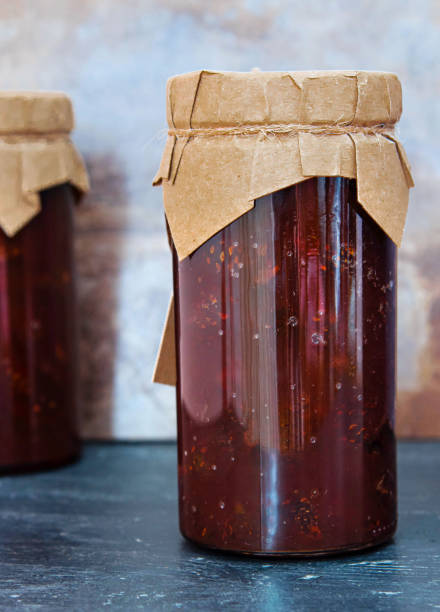 istock Jam from young pine cones collected in the Carpathian Mountains. Natural cough syrup 1406204132