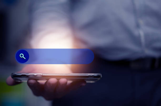 istock businessman hold tablet with search bar graphic for technology concept 1406209798