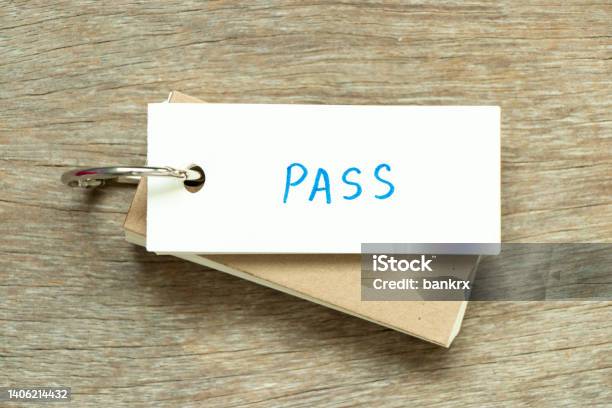 Flash Card With Handwriting Word Pass On Wood Background Stock Photo - Download Image Now