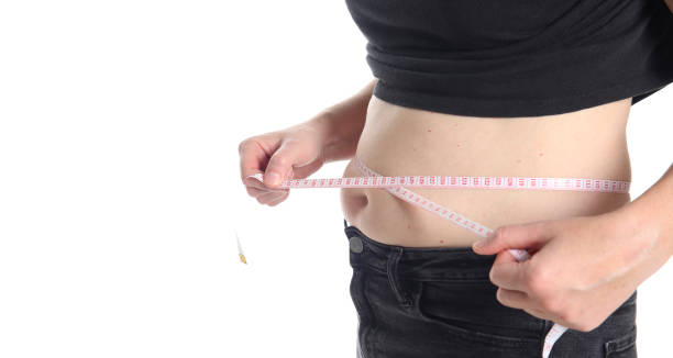 istock Close-up of a Woman's Fat Belly. 1406218806
