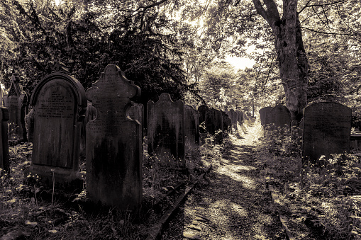 Haworth churchyard with headstones, this is beside the Bronte Parsonage and church where Anne, Emily and Charlotte Bronte lived and wrote.