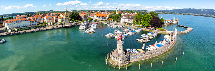 Lindau with marina town at lake Constance Bodensee panorama yachts travel traveling from above top view in Germany