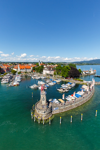 Lindau with marina town at lake Constance Bodensee portrait format yachts travel traveling from above top view in Germany