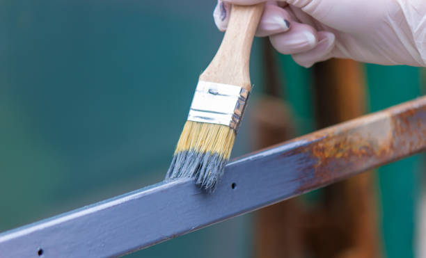 istock paint the iron frame with gray paint. 1406222275