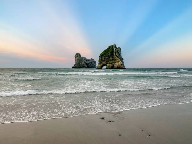 Wharariki Beach and Archway Islands view, Golden Bay, South Island, New Zealand South Island, New Zealand. nelson landscape beach sand stock pictures, royalty-free photos & images