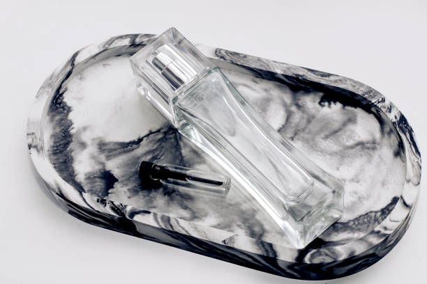 istock Oil essential natural perfumes in a bottle on a decorative stand 1406229407
