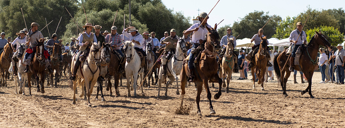 El Rocio, Huelva, Spain : 06.26.2022. Transfer of mares is a livestock event carried out with swamp mares, which is held annually in the municipality of Almonte, Huelva. In Spanish called \