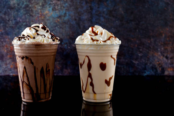istock Milkshakes of different flavors on a dark background. 1406237187