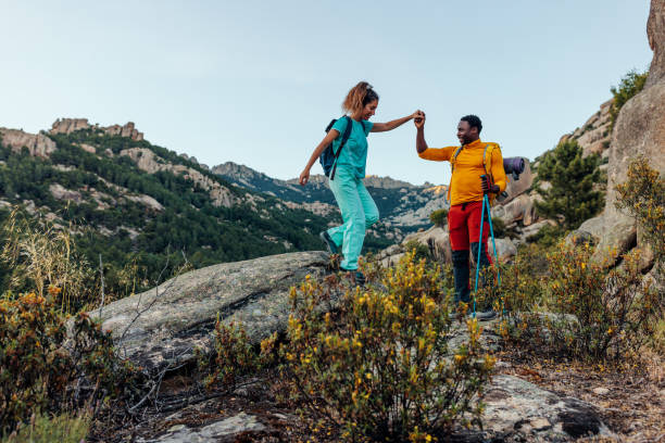 istock Hikers climbing in the mountains 1406242348