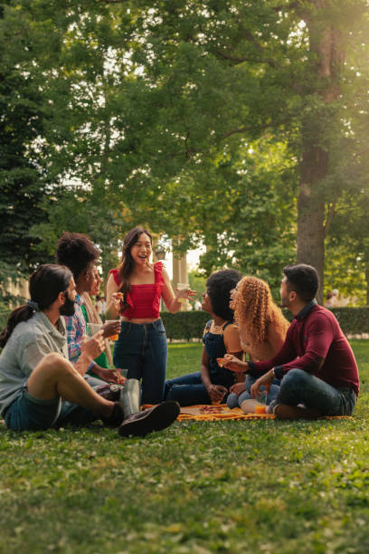istock Excited friends having picnic 1406242439