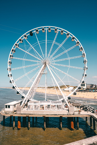 Ferrirswheel in Scheveningen at the coast in the Netherlands during the summer