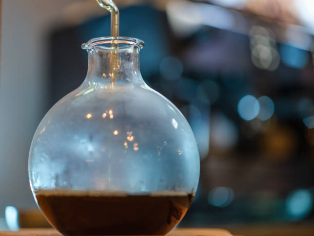 a fresh black coffee prepared by the barista