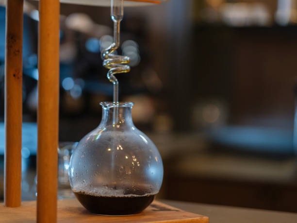 a fresh black coffee prepared by the barista
