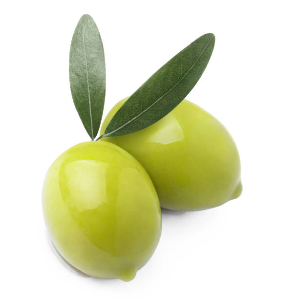 istock Delicious green olives with leaves on white 1406244587