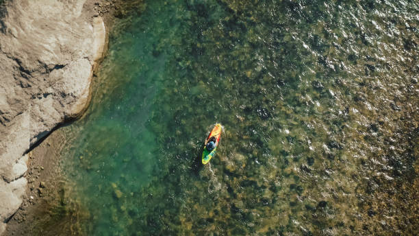 istock Kayak on a river, aerial shot 1406244775