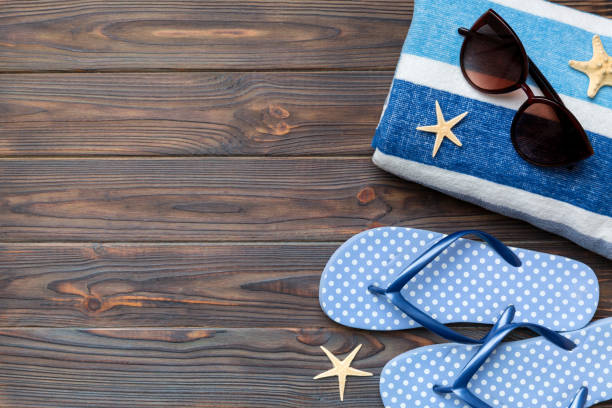 istock Summer vacation concept flat lay. beach accessories and towel top view. Space for text. travel concept 1406250194