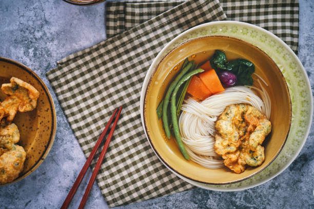 istock Vegan Soba Noodle Soup with Carrots, Thai Eggplants and Fried Bok Choy 1406253631