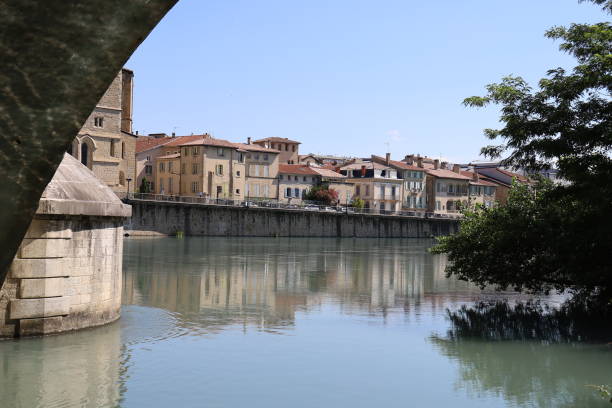 Novels about Isère - Overview Overview of Romans along the Isere river, town of Romans sur Isere, Drome department, France isere river stock pictures, royalty-free photos & images