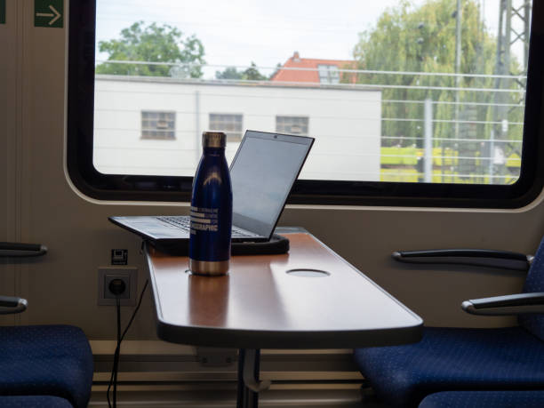 istock Laptop on the table in the train. 1406255331