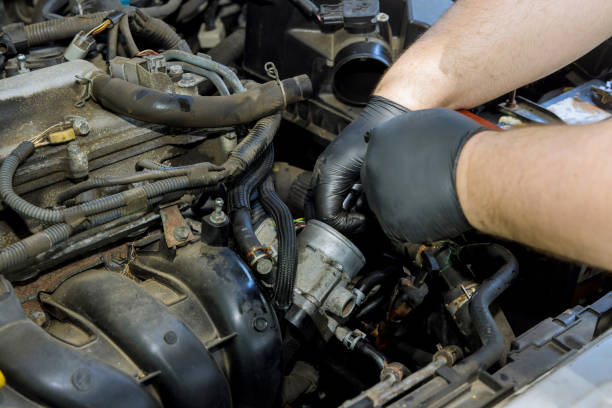 Throttle pipe with throttle position sensor and mass air flow sensor Throttle pipe with throttle position sensor and mass air flow sensor on motor block throttle stock pictures, royalty-free photos & images