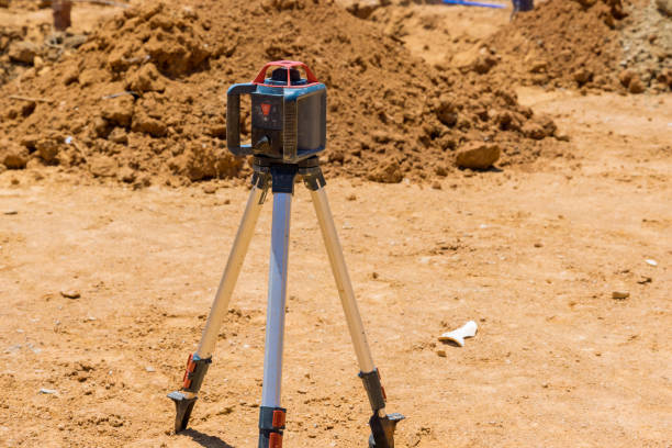 istock When road construction is underway, the contractor uses leveling rotary laser measuring equipment 1406255739